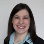 Professional woman smiling, representing Christian Financial Advisors team.