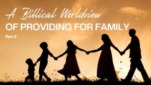 Silhouettes of a family holding hands at sunset, symbolizing biblical family values.